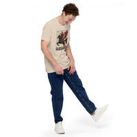 Man Wearing A Cream Deus Vult T-shirt, Right Front View