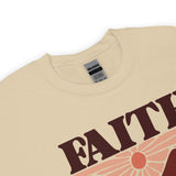Close Up Of A Faith Can Move Mountains Sweatshirt In Sand