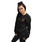 Woman Wearing A Black God Is Good Sweatshirt, Front View